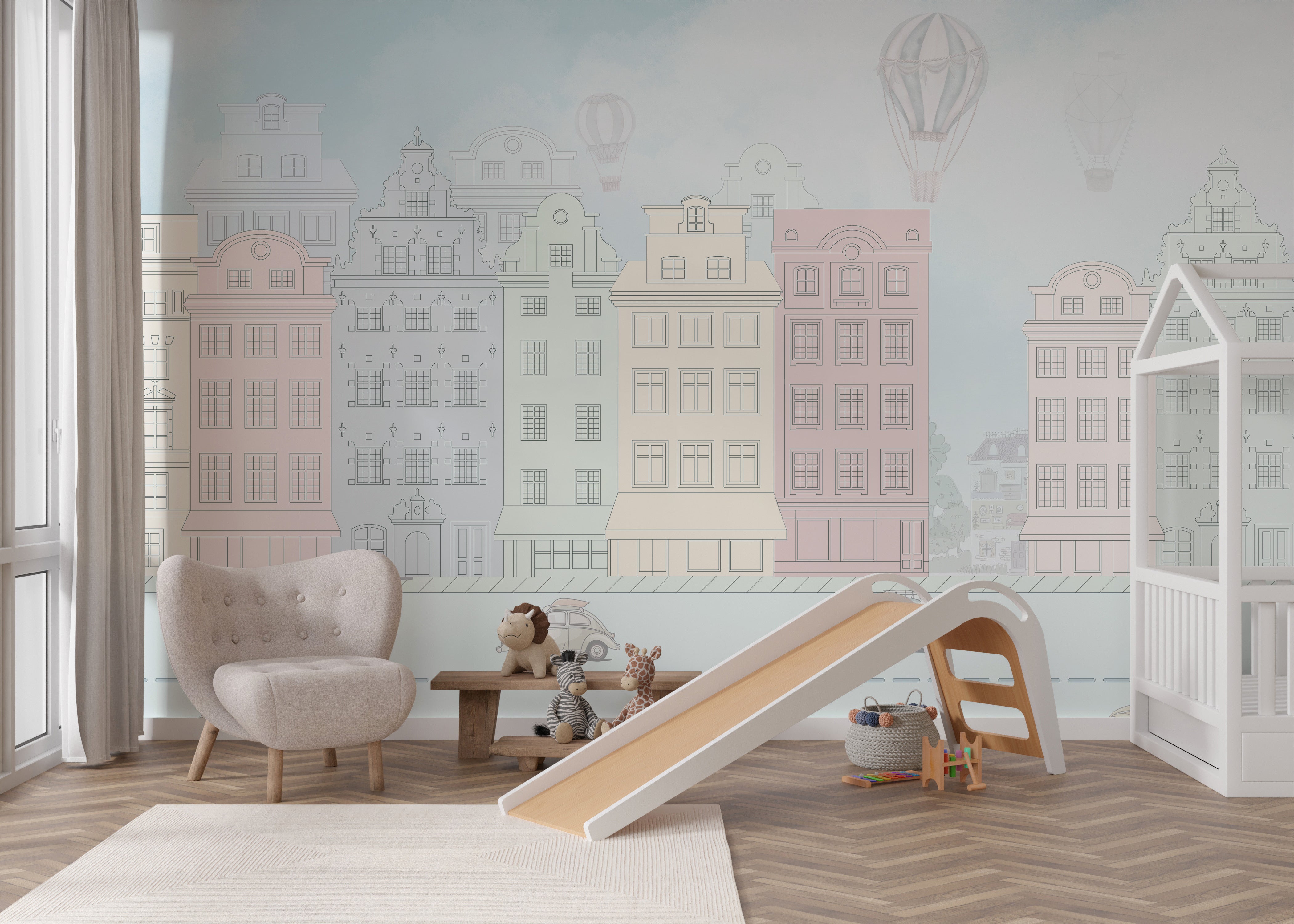 Whimsical street scene mural with classic pastel houses, floating hot air balloons, and light clouds.