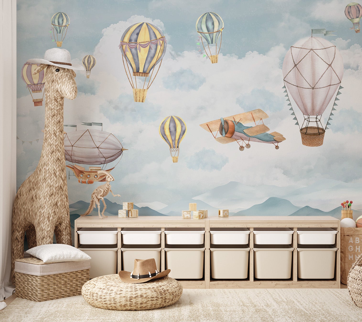 A peaceful flight of balloons and airships over cloud-covered mountains.