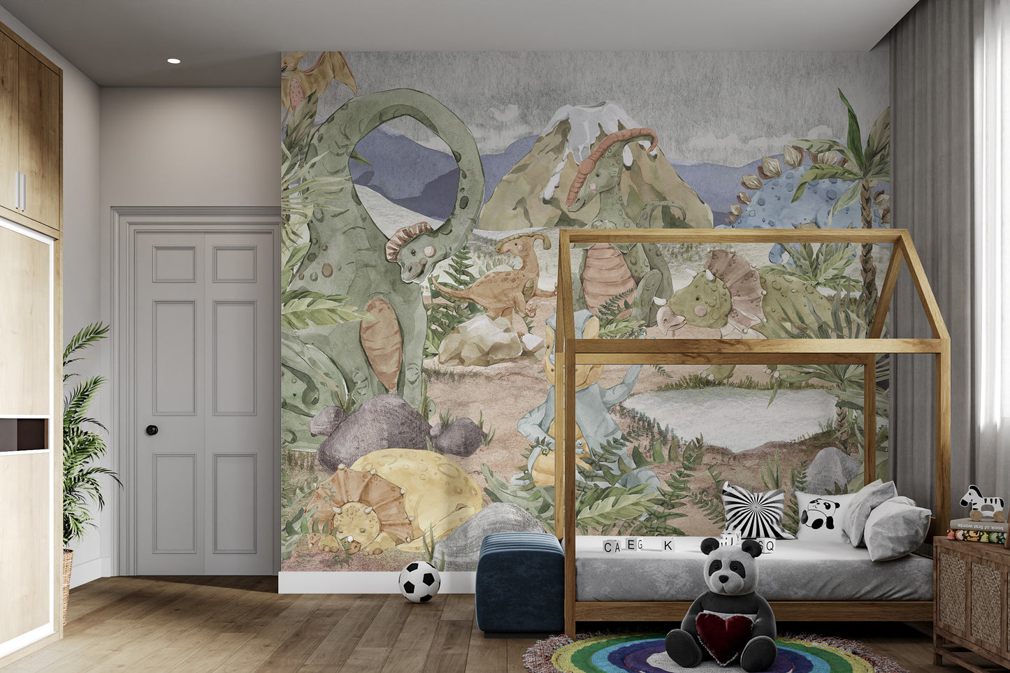 Soft pastel dinosaurs with plants, rocks, and mountains in a kids' wallpaper mural.