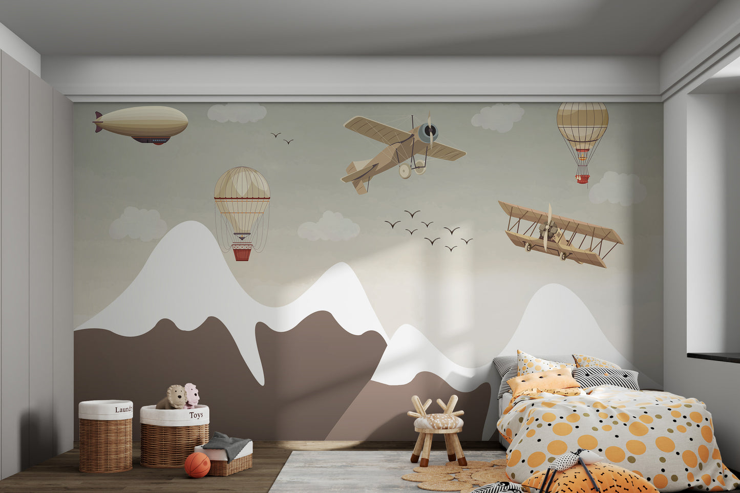 Snow-covered mountain peaks with birds, vintage airplanes, and hot air balloons floating above.