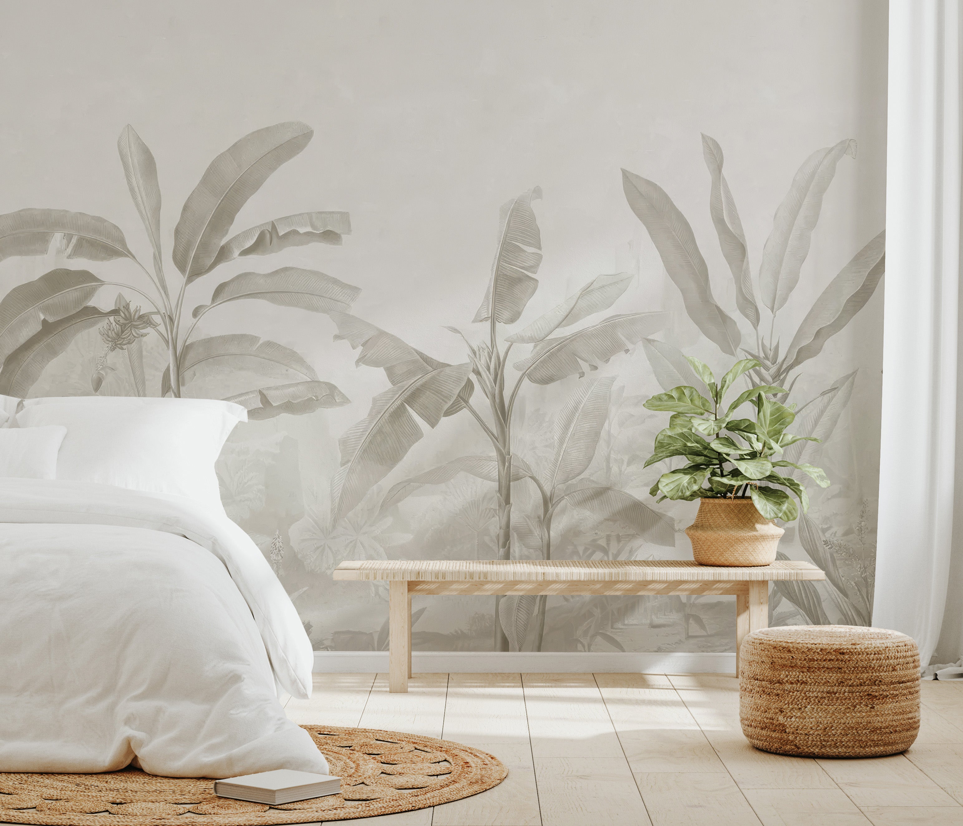 Neutral tropical wallpaper with banana leaves and delicate landscape elements.