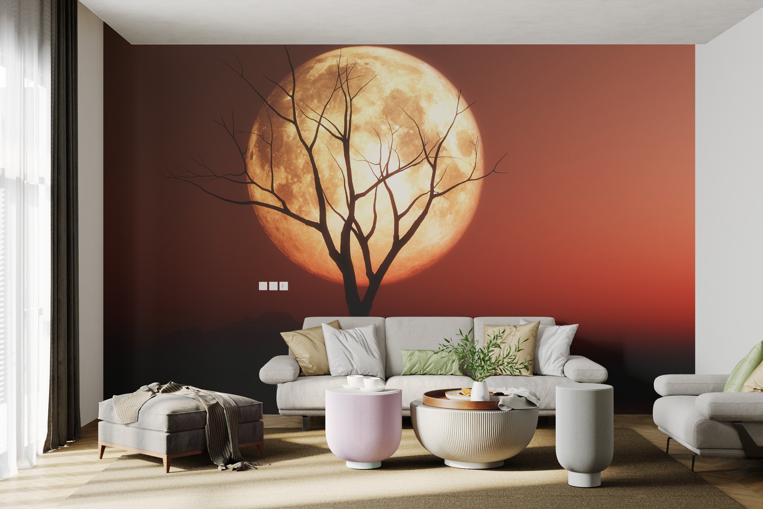 Red moon wall art with silhouetted tree in foreground
