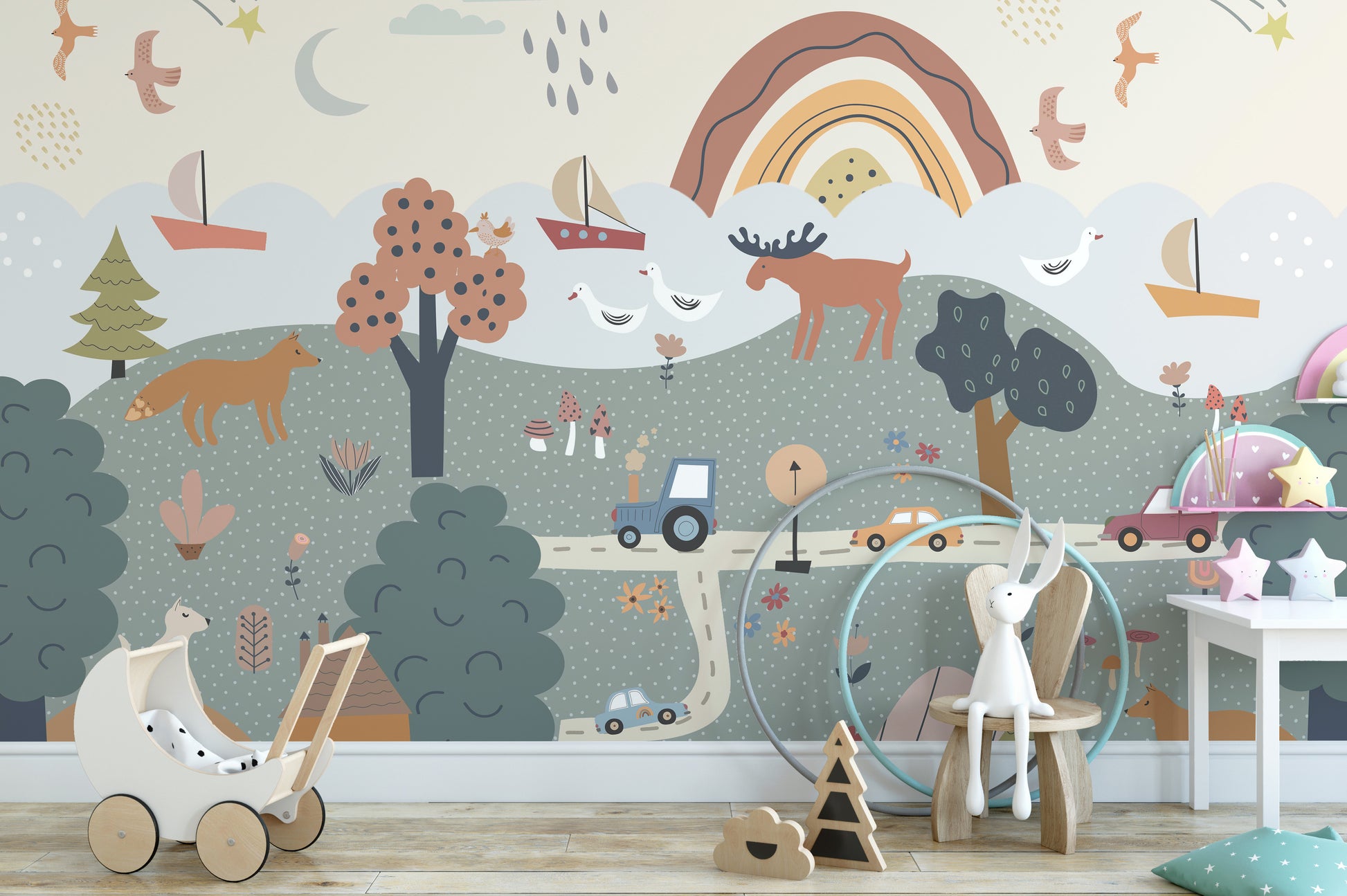 Storybook landscape mural with trees, animals, and rainbow
